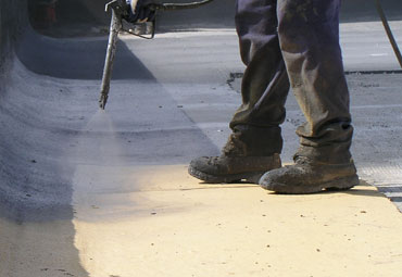Coating systems over Mesa spray foam roof systems